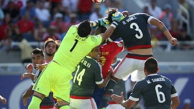 Paraguay goalkeeper Justo Villar, left, clears the ball during the Copa America Centenario match against Costa Rica. Gregg Newton / AFP