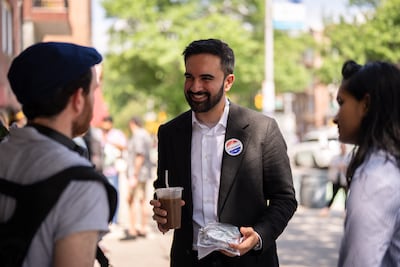 Zohran Mamdani, New York City mayoral candidate, speaks to pedestrians after a campaign event in the Queens borough of New York, on June 19. Bloomberg