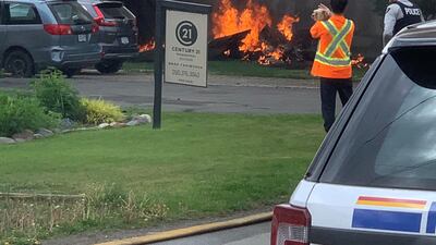 The crash site of a jet from the Canadian air force's Snowbirds aerobatics team. Elwood Delaney/via Reuters.
