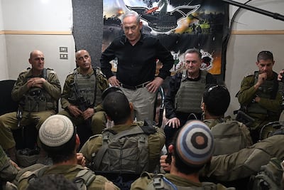 Israel's Prime Minister Benjamin Netanyahu speaks to Israeli troops during a visit to southern Lebanon on Tuesday, with Defence Minister Israel Katz, second right. Photo: Prime Minister's Office / X