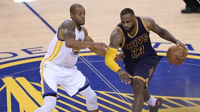 Cleveland Cavaliers forward LeBron James (R) drives by Golden State Warriors guard Andre Iguodala (L) in the second half of Game Five of the NBA Finals at Oracle Arena in Oakland, California, USA, 14 June 2015. The winner of best of seven series will be NBA Finals Champions. EPA/JOHN G. MABANGLO CORBIS OUT