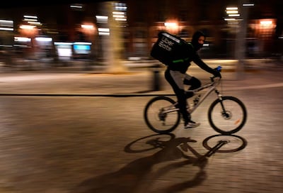 The gig economy is often described as a free market where companies hire freelancers to provide services, most notably ride-hailing and food delivery, to cut costs. AFP