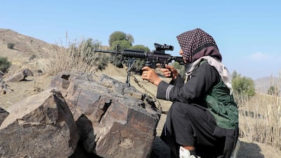 A Taliban security personnel keeps watch near the Durand Line in Afghanistan. AFP