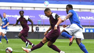 Kylian Mbappe scores PSG's first goal in the 4-1 win over Strasbourg. AFP