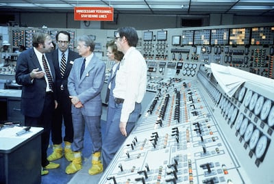 President Jimmy Carter, first lady Rosalynn Carter and Pennsylvania governor Richard L Thornburgh in a control room at the Three Mile Island nuclear plant in April 1979. Getty Images
