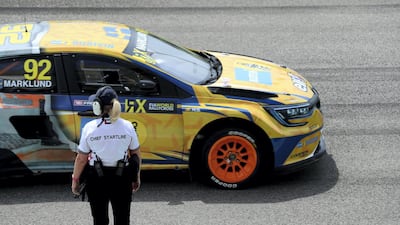 Marklund speeds past the chief startling during the World RX Warm-up during the FIA World RallyCross Championship 2019 Abu Dhabi.