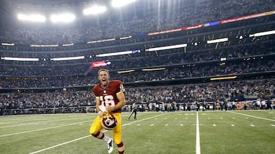 Washington quarterback Colt McCoy celebrates after his team's victory over the Dallas Cowboys in the NFL on Monday night. Tim Sharp / AP / October 27, 2014