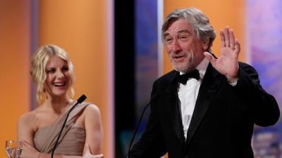 Master of ceremony Melanie Laurent, left, and the Cannes jury president, Robert De Niro.