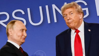 US President Donald Trump looks on next to Russian President Vladimir Putin during a press conference following their meeting to negotiate an end to the war in Ukraine in Anchorage, Alaska. Reuters