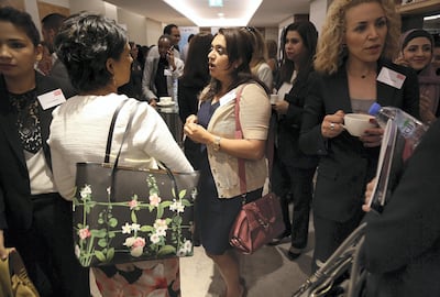 Women network at the Return to Work Career Fair in Dubai. Satish Kumar / The National