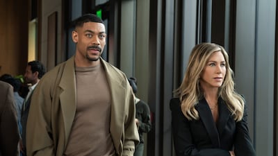 Aaron Pierre, left and Jennifer Aniston in season four of The Morning Show. Photo: Apple TV+