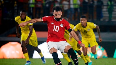 Egypt's Mohamed Salah scores their second goal from the penalty spot deep into injury time to claim a 2-2 draw against Mozambique. AFP