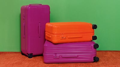 Rimowa has added orange and magenta to its Essential and Groove ranges. Photo: Rimowa