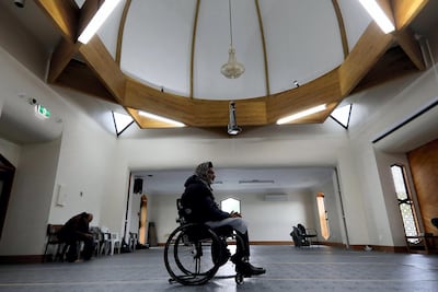 Farid Ahmed, a survivor of the massacre, offers prayers inside Al Noor mosque. AFP