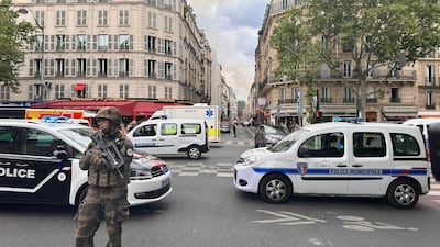 French police and soldiers secure the area after several buildings caught fire. Reuters