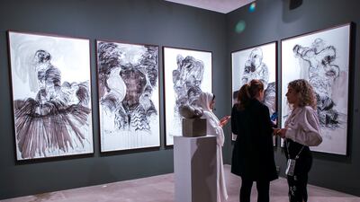 Dystopia is not a Noun includes eight paintings and one sculpture. Victor Besa / The National