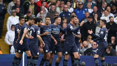 Rodri celebrates scoring with teammates. Reuters
