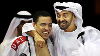 ABU DHABI, UNITED ARAB EMIRATES - April 14, 2012 - Sheikh Mohammed bin Zayed, Crown Prince of Abu Dhabi, Deputy Supreme Commander of the UAE Armed Forces, congratulates Faisal Al Ketbi on his golden win Saturday night at the World Professional Jiu-Jitsu Championship in Abu Dhabi on Saturday, April 14, 2012 at ADNEC. ( DELORES JOHNSON / The National )