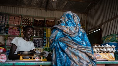 Hassan, 16, works at a market stall in Shagarab. The camp was set up in 1968 and lies about 70 kilometres west of the Eritrean border. Getty