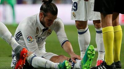 Real Madrid's Gareth Bale went down with an injury during their Primera Liga match with Barcelona. Susana Vera / Reuters