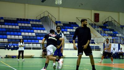 Reyadh oversees a training session of the men's team.