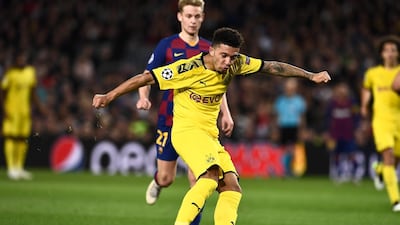 Substitute Jadon Sancho scores a consolation for Dortmund. AFP