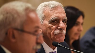 Sacked Turkish mayors Adnan Selcuk Mizrakli, left, Ahmet Turk, centre, and Bedia Ozgokce Ertan address reporters in Istanbul on August 29, 2019. AFP