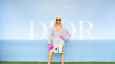 US model, make-up artist, recording artist and reality television personality Miss Fame attends the Dior Homme photocall. Getty Images For Christian Dior