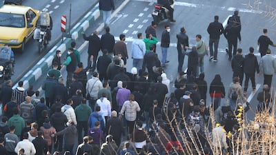 Shopkeepers and traders protest in Tehran. AFP