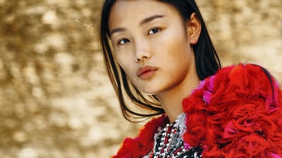 Shown on a barge, Balmain presented new and archive looks for autumn / winter 2020 haute couture. Courtesy Balmain