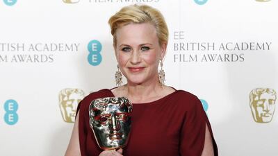 Patricia Arquette holds the award for best supporting actress for Boyhood at the British Academy of Film and Arts (BAFTA) awards ceremony. Reuters