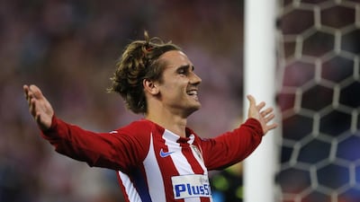 Atletico Madrid's Antoine Griezmann celebrates after scoring against Leicester City in the Uefa Champions League quarter-finals. Paul White / AP file