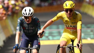 UAE Team Emirates' Tadej Pogacar congratulates Jonas Vingegaard on his stage win. AFP