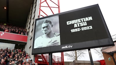 An image of former Premier League player Christian Atsu, who was recovered from the rubble of his home in Hatay following the Turkey earthquake, is shown on the screen as a minute's silence is observed in his memory prior to the Premier League match against Manchester City at City Ground on February 18, 2023 in Nottingham, England. Getty Images