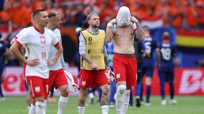 Jakub Moder of Poland reacts at full-time. Getty Images