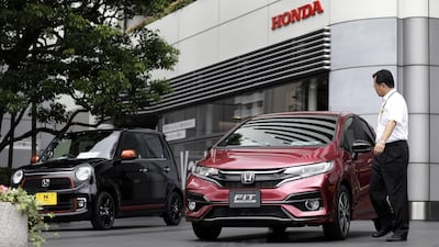 Car dealerships are looking to attract more women. Kiyoshi Ota/Bloomberg