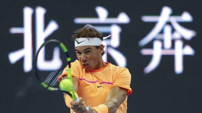 Rafael Nadal returns a shot to Paolo Lorenzi during his second round win at the China Open on Tuesday. Lintao Zhang / Getty Images / October 4, 2016