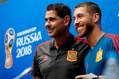 Fernando Hierro, left, the Spain coach, with captain Sergio Ramos. Adrian Dennis / AFP