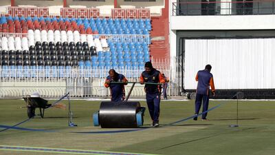 Ground staff prepare the pitch at Rawalpindi Cricket Stadium. EPA