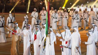 Sheikh Rashid bin Humaid (L), Sheikh Ammar bin Humaid, Crown Prince of Ajman (2nd L), Lt Gen Sheikh Saif bin Zayed, Deputy Prime Minister and Minister of Interior (3rd L), Sheikh Hamed bin Zayed, Chairman of Crown Prince Court - Abu Dhabi and Managing Director of the Abu Dhabi Investment Authority (ADIA) (R), Sheikh Nahyan bin Saif (2nd R) and other dignitaries attend the 44th UAE National Day celebrations at Zayed Sports City. Mohamed Al Hammadi / Crown Prince Court - Abu Dhabi