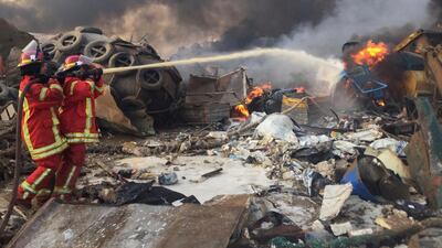 Firefighters spray water at a blaze after the explosion in Beirut. Reuters