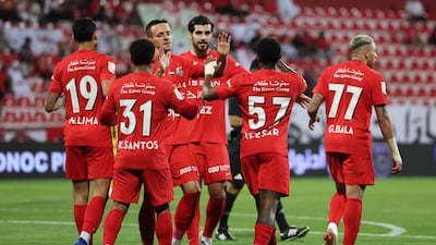 Shabab Al Ahli players during the UAE Pro League match against Kalba at the Rashid Stadium in Dubai. Chris Whiteoak / The National