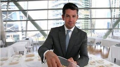 Malcolm Wall Morris, the chief executive of the Dubai Multi Commodities Centre, with pearls traded in one of the exchanges. Pawan Singh / The National