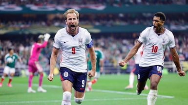 England's forward #09 Harry Kane celebrates scoring his team's third goal with England's midfielder #10 Jude Bellingham during the 2026 World Cup round of 16 football match between Mexico and England at the Mexico City Stadium in Mexico City on July 5, 2026. (Photo by Rodrigo Oropeza / AFP)
