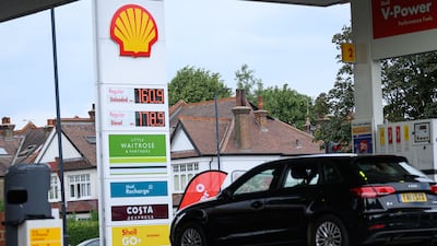 Fuel prices are displayed on the digital board at a petrol station in London, as Brent crude hit $100 per barrel for the first time since May. Getty Images