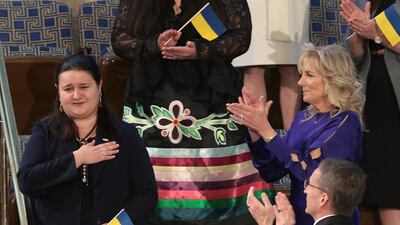 Ukraine's ambassador to the US, Oksana Markarova, acknowledges applause from US first lady Jill Biden as they attend President Joe Biden's first State of the Union address in Washington. AFP