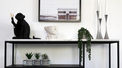 By styling the home in stages, starting with the high-traffic areas where guests are entertained, the costs are spread out over a long period of time. Pawan Singh / The National