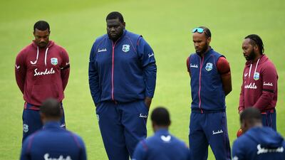 Left to right: Shannon Garbiel, Rahkeem Cornwall, Kraigg Braithwaite and Jomel Warrican of the West Indies observe a minutes silence with their team mates in memory of former West Indies batsman Sir Everton Weekes. Getty