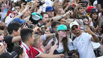 Formula One world champion Lewis Hamilton of Mercedes-GP meets fans at Yas Marina Circuit. Christopher Pike / The National