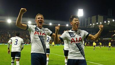 WATFORD, ENGLAND - DECEMBER 28: Son Heung-min (R) of Tottenham Hotspur celebrates scoring his team's second goal with his team mate Harry Kane (L) during the Barclays Premier League match between Watford and Tottenham Hotspur at Vicarage Road on December 28, 2015 in Watford, England. (Photo by Richard Heathcote/Getty Images)